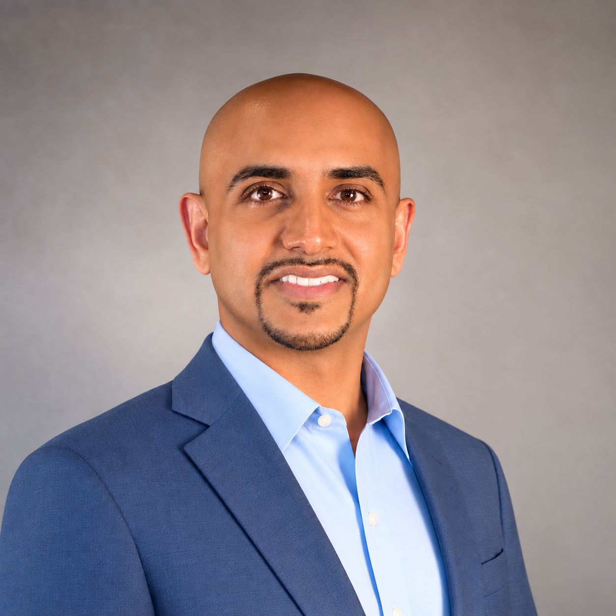 Dr. Tharsan Sivakumar professional portrait